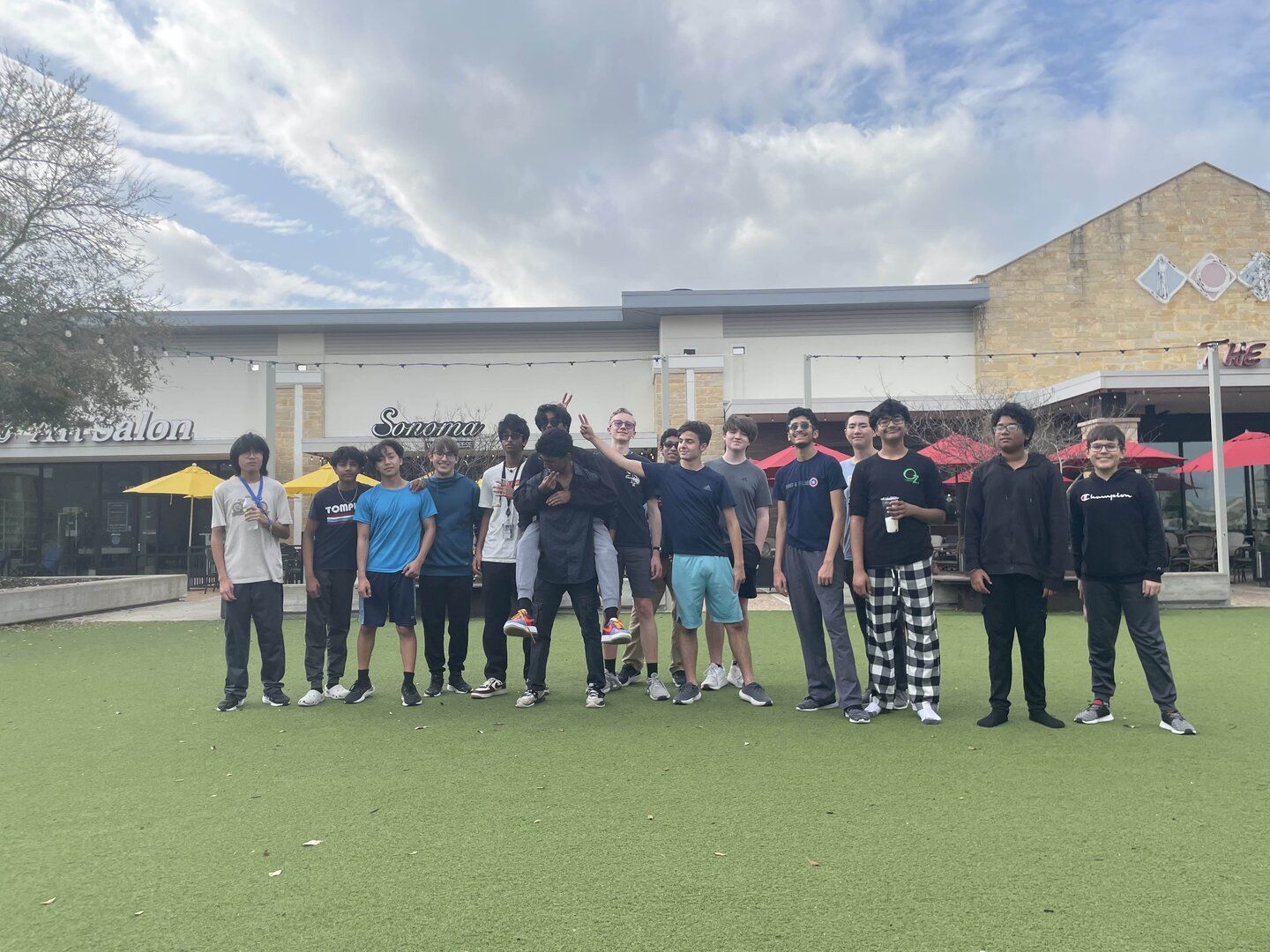 A group of ReEnvision members standing together outdoors